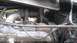 1959 Kenworth W900A - Close-up view of a truck's engine compartment, highlighting the turbocharger and exhaust piping. Text indicates 'FIRING ORDER 1-3-6-2-5-4'.