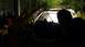 1973 Ford Torino - A dark, blurry photo shows the interior of a car at night.