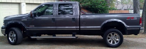 Side view of a dark gray Ford F-350 Super Duty pickup truck, model year 2005