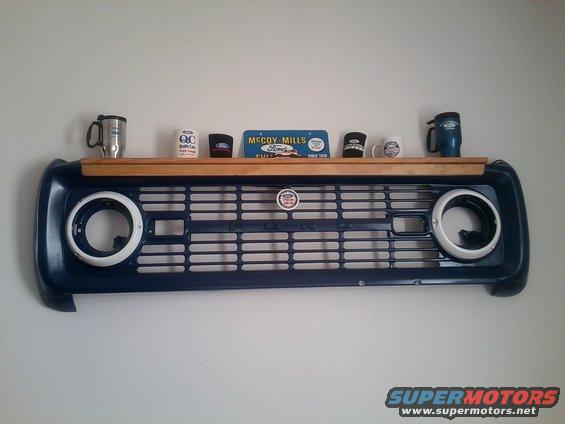 1966 Ford Bronco grille shelf with Ford badge and McCoy-Mills sign