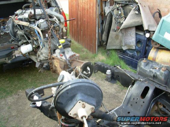 07enj.jpg The dually is in Park - I'm rolling the chassis under the engine.

[url=http://www.supermotors.net/registry/22771/78471-2][img]http://www.supermotors.net/getfile/901056/thumbnail/24hoisted.jpg[/img][/url]