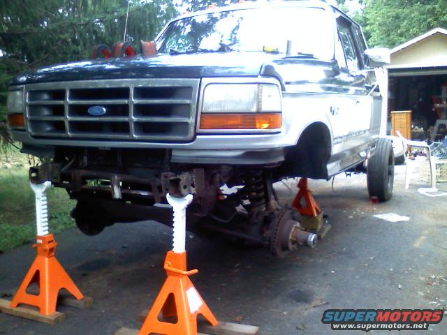 Front end on jacks, allowing the wet noodle suspension to flop all over the place, cant wait to junk this ttb!