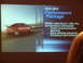 1992 Ford Taurus - Presentation slide shows a red sedan with text about the SHO Performance Package.