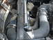 1978 Nissan 300ZX - Aftermarket air intake system installed in an engine bay, with radiator and coolant reservoir in view.