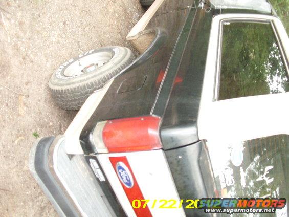 picture-018.jpg But she is pretty straight and it is the original paint, just a few minor dings... An for a factory black truck, you really couldn't ask for much more then that, being 24 years old... It does look like somebody stripped the hood and rattle canned some black on it, overspray is everywhere which isn't a big deal...