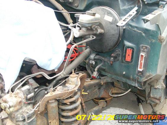 picture-010.jpg This is where it will be fun in a few days. My plan is to cut the firewall on this side completely off,  then weld it back on to my 88 bronco. This is so i can save my 5spd trans and use the dash, harnesses, etc  from this newer model 95 bronco.

There are rust wholes threw this shock tower and the Radius arm rear bracket is not even completely attached anymore on the left side.