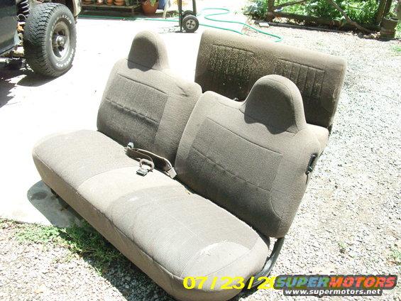 picture-031.jpg Pulling the front seats out are pretty easy. 13mm socket and a breaking bar to get 2 bolts up front and 2 nuts on the rear. Just slide the seat forward and back for clearance.

The center seat belts take a 55 torx and use your breaker bar... they are 2 inch long bolts & yes they are a PITA to get out.

The back seat has 2 pins up front, just remove the clip from the pin and push the leaver on the rear bottom to remove. The brackets have the same 55 torx bolts that your seatbelts hand, they are just as tough to remove...