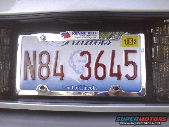 Illinois license plate N84 3645 with a Kenne Bell Twin Screw Supercharged sticker and a 10-12 expiration sticker