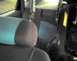 1997 Ford Taurus - Interior view of a car's rear seating area, with a visible warning label on the side.