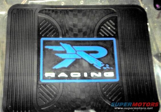 Black car floor mat with blue XR Racing logo and checkered pattern detail