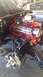 1973 Chevrolet Camaro - Car engine and front suspension components are disassembled and visible.