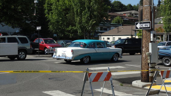 Two-tone blue and white 1956 sedan, rear view