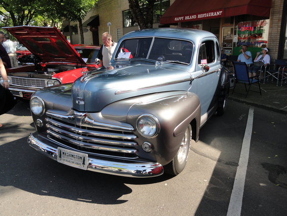Blue and grey 1940s Ford Coupe with chrome grille and Washington license plate