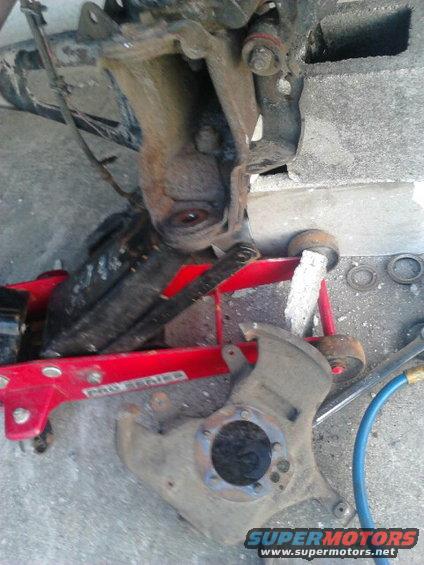 14.jpg Got the knuckle off. This being the 5 stud knuckle, it threw it in my shed of spare parts. If you Have the 6 stud knuckle your gonna be using it and isnt 100% nessecary to remove the knuckle