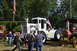 1959 Kenworth W900A - Tractor show features a white tractor and a red steam engine tractor on display.