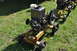 1959 Kenworth W900A - Multiple engines on trailers are displayed on a grassy field.