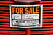 1959 Kenworth W900A - A FOR SALE sign is attached to a red grille, detailing a 1954 International TD-6 ORCHORD.