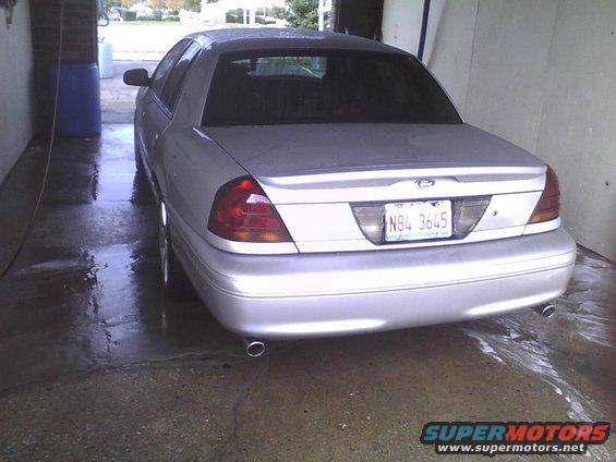 2003 Ford Crown Victoria rear view in a car wash bay. License plate N84 3645