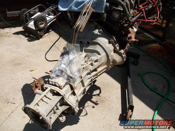 Transmission and engine components on a stand