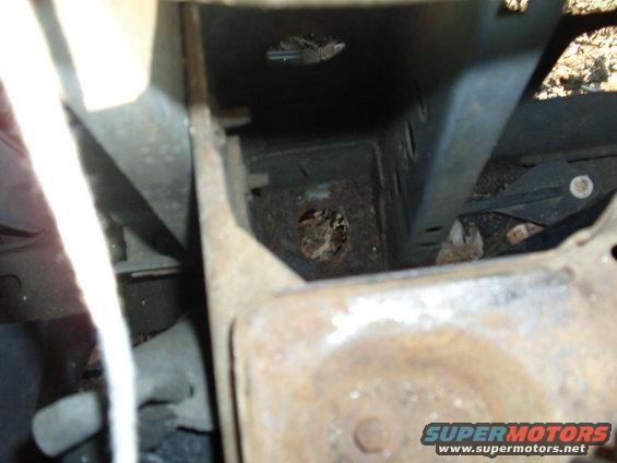 picture-064.jpg As easy as it was to remove the front body mounts on the 95 (as they where so rusted they just fell out).

 The 88 was pretty much rust free, now it might have took a good breaker bar to get them started, but both sides came out within about 5 mins.  What you see down there is mostly grease.