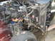 1988 Ford Bronco - Disassembled vehicle engine bay, revealing internal components and suspension structure.