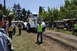 1959 Kenworth W900A - A large white tractor is seen at an outdoor event with spectators watching.