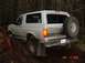 1989 Ford Bronco - Alvie getting some rocker damage on a stump on powerline