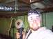 1991 Ford Crown Victoria - Man with angle grinder in workshop setting.