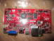 1963 Ford Falcon - A red circuit board with visible components and connectors, not a vehicle.