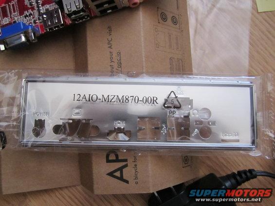 Computer motherboard I/O shield with ports labeled POWER, HDMI, and part number 12AIO-MZM870-00R