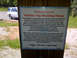 1982 Ford Bronco - Sign at Panther Top Shooting Range details rules and club information, with a white SUV parked nearby.