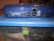 1963 Ford Falcon - This blue computer case shows various ports, including VGA, HDMI, and USB connections.