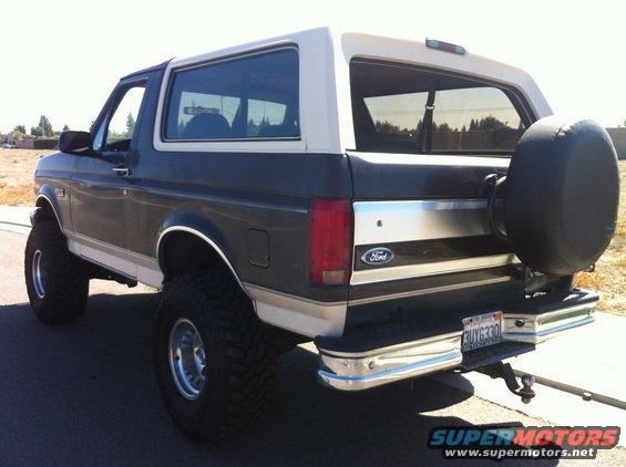 1992 Ford Bronco rear view, dark gray and white with spare tire