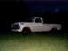 1967 Ford F-250 - White 1967 Ford F-250 pickup truck sits in a grassy field under the moonlight.