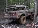 1989 Ford Bronco - This 1978 Ford Bronco navigates a rocky trail with its soft top deployed.