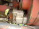 1988 Ford Bronco - This image shows a close-up view of a hydraulic pump assembly, likely from a tractor or heavy equipment.