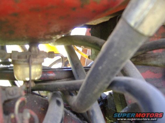 Fuel filter and hoses on red machinery