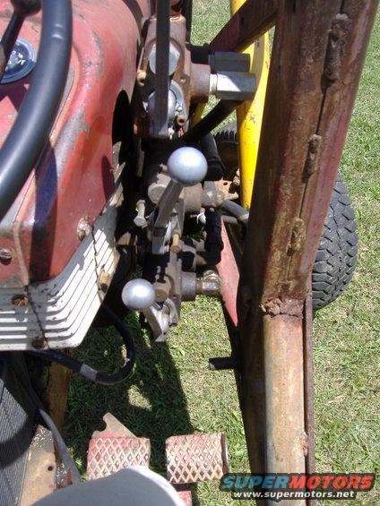 Close-up of tractor gear shifts and pedals