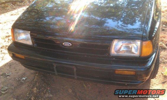 1991 Ford Festiva front end with Ford badge and rectangular headlights