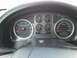 2007 Ford F-150 - The dashboard of a 2007 Ford F-150 displays various gauges including the speedometer and tachometer.