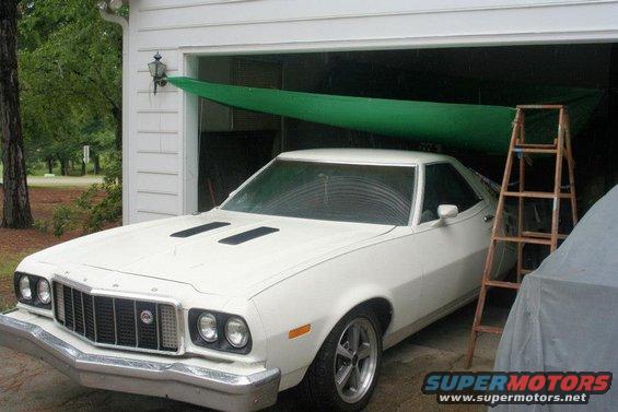 White 1976 Ford Ranchero front view with hood scoops and prominent grille