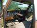 1979 Ford F-150 - The interior of a 1979 Ford F-150 shows the dashboard, steering wheel, and seats.