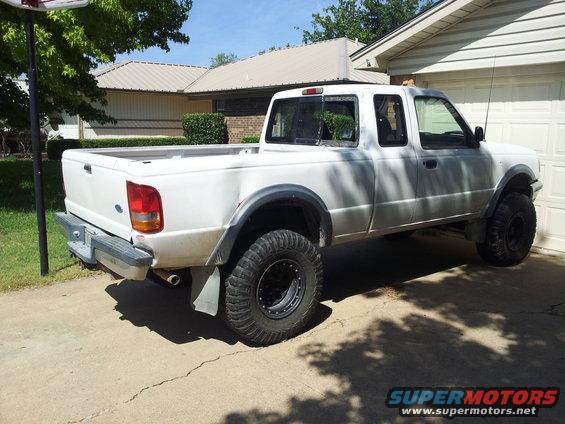 White 1994 Ford Ranger pickup truck, rear 3/4 view