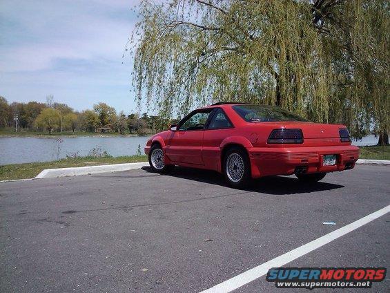 1991 Pontiac Grand Prix coupe, rear 3/4 view, red