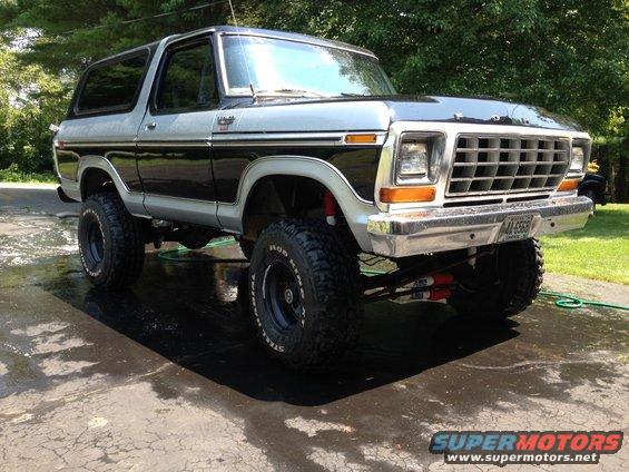 Lifted 1979 Ford Bronco, black and silver two-tone, 3/4 front view
