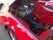 1970 Ford Ranchero - Close-up of a red sports car's engine bay, showing the V8 engine and air intake system.