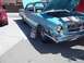 1970 Ford Ranchero - This 1962 Chrysler 300 is displayed with its hood open, revealing the engine and informational materials.