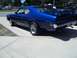 1970 Ford Ranchero - This blue 1970 Ford Ranchero GT coupe is seen from the rear, its classic body style and chrome wheels.