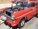 1970 Ford Ranchero - This red 1955 Chevrolet Nomad station wagon features an exposed engine and custom lettering on the door.