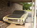 1972 Ford Ranchero - This 1970 Ford Ranchero, identified by its grille and body style, is parked under a carport.